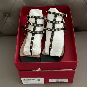 Valentino Garavani
Rockstud Ankle-Strap Leather Thong Sandals size 38.5. New